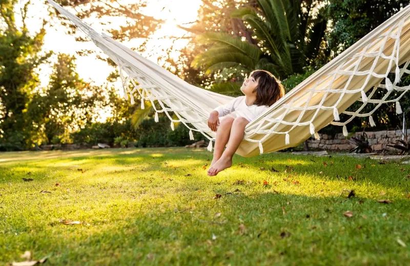 Child outside in ant-free yard 